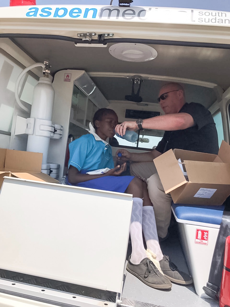 Healthcare professional providing care in a mobile clinic